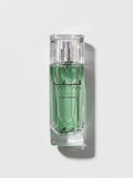 Rasasi Fattan — clear glass bottle of pale green juice with a clear cap, FATTAN Pour Homme, top-down