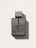 Club De Nuit Intense Man Limited Edition Parfum — black bottle, chained ARMAF medallion, red Arabic script, top-down