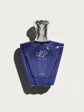 Turathi Blue by Afnan — deep blue faceted fan-shaped bottle with a silver crown cap, top-down
